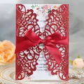 Elegant red glitter laser-cut wedding invitation card with a luxurious satin ribbon bow - Glitter Red