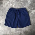 Men's royal blue quick-dry beach shorts with elastic waistband and black drawstring - M / Bottoms / Navy Blue