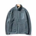 Veste en polaire de laine d'agneau bleu brouillard pour hommes avec col montant et poches zippées - M / Hauts / Bleu Brume