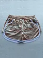 Detailed view of breathable camouflage athletic shorts with drawstring and white piping - M / Bottoms / Khaki Camouflage