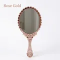 Elegant vintage rose gold portable handheld makeup mirror with ornate frame detail - Vintage / Rose Gold