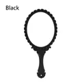Elegant vintage oval handheld makeup mirror featuring a decorative black ornate frame - Vintage / Black
