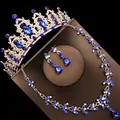 Detailed view of luxury gold bridal jewelry set featuring blue teardrop crystals and tiara - Stud Pin Style / Three-Piece Set / Gold (Blue Stone)