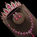 Detailed view of elegant pink crystal bridal luxury crown, necklace and earrings set. - Stud Pin Style / Three-Piece Set / Gold (Fuchsia Zirconia)