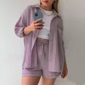 Detailed view of women's purple crinkle fabric shirt and drawstring shorts set - S / Top And Bottom / Light Purple