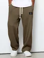 Detailansicht der olivgrünen Waffelstrick-Stoffhose für Herren, locker und gerade geschnitten - Dunkelbraun / S