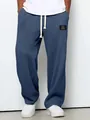 Detailansicht der blauen Waffelstrick-Hose für Herren mit Textur und Kordelzug am Bund. - Marineblau / S