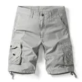 Detail view of light grey cargo shorts with multiple utility pockets and drawstring hem. - 38 / Bottoms / Grayish White
