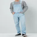 Full-length view of men's light blue denim overalls over a striped long-sleeve shirt - S / Top And Bottom / Light Blue