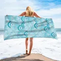 Large microfiber beach towel featuring a blue and white seashell pattern with gold accents - 75x150cm / Shell Style