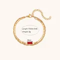 Gedetailleerd overzicht van een gouden dubbellaagse armband met een rode edelsteen. - Dubbellaagse Rechthoekige Steenstijl (B0333) / Goud+Rood