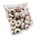 Macro view of a bulk package containing natural pink and white sea urchin shells for decor - Pink and White Sea Urchin (5-6cm)