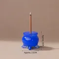 Miniature blue crystal incense holder with tripod legs, measuring 3cm high and 3.2cm wide - Blue Opalite Small Incense Burner / 3.2x3cm
