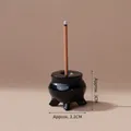 Miniature black cauldron incense holder with dimensions 3cm height and 3.2cm width - Obsidian Small Incense Burner / 3.2x3cm