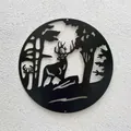 Circular black iron laser-cut wall hanging decor featuring deer and forest silhouettes - Deer