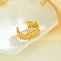 Elegant gold-colored stainless steel open ring featuring a unique irregular vertical line texture - Irregular Vertical Lines (GJ079) / Gold