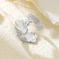 Elegant silver stainless steel adjustable ring featuring a textured shell design. - Irregular Fan Texture (GJ080)
