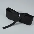 Detailweergave van de textuur van een rol van 100m zwarte nylon ritsband voor naai - Nr. 3 (100 Meter/Rol) / Zwart