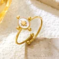 Elegant gold stainless steel open ring with celestial star motif detail - Octagonal Star White Pearlescent (GJ092)