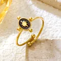 Vintage gold stainless steel adjustable ring with celestial star on black enamel. - Star Celestial Black (GJ092)