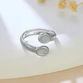 Minimalist silver stainless steel open ring with ribbed texture and oval ends - Threaded Oval Design (GJ101)