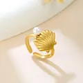 Elegant gold shell-shaped adjustable ring featuring a white pearl accent in matte finish - Seashell Shape Pearl (GJ103)