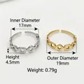 Adjustable stainless steel geometric ring featuring square and diamond pattern cutouts - Rhombus Links / Steel