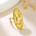 Gold stainless steel irregular oval ring with pearl, unique textured adjustable band. - Ripple Oval Pearl (GJ110)