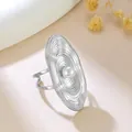 Unique silver stainless steel ring with irregular ripple texture and central pearl accent. - Oval Disc Ripple (GJ110)