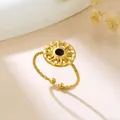 Elegant gold plated stainless steel open ring featuring a sunburst motif with black center - Sunburst Twisted Rope (GJ113)