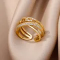 Detailed macro view of an 18K gold plated multi-layer ring with sparkling white zircon stones - Three-Layer Criss-Cross Micro-Inlaid Zirconia Style (G7194461)
