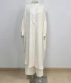 Full front view of a striped stand collar long shirt and wide-leg pants set on a mannequin - Striped Jacket And Trousers Set - Beige