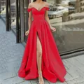 Elegant bright red off-the-shoulder evening gown featuring a sexy high slit and V-neckline - Red / US2