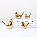 Figuras de pájaros de cerámica dorada para decoración de hogar de estilo nórdico - Juego de 4 Piezas Dorado
