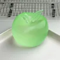 Green apple shaped Vaseline squishy toy with a frosted finish on white tray. - Vaseline Apple / Green