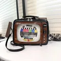Vintage TV-shaped crossbody jelly bag with colorful no-signal test pattern - Brown