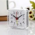 Compact white square quartz alarm clock with transparent plastic shell for bedside - White