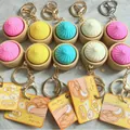 Selectie van kleurrijke baozi stressverlichtende sleutelhangers voor ontspanning en plezier - Broodje Knop (Met Kaart)