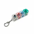 Detailed macro view of 4-key mechanical switch fidget toy keychain with colorful keycaps. - Integrated 4 Keys / Multicolor / Transparent Four Colors