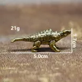 Detailed size view of a vintage brass Ankylosaurus dinosaur figurine, weighing 21g - Ankylosaurus