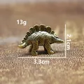 Detailed view of vintage brass stegosaurus figurine showing 13g weight and size dimensions - Stegosaurus