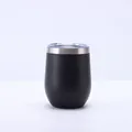 Close-up of a matte black 12oz stainless steel wine tumbler with a clear lid and silver rim. - With Lid / Black
