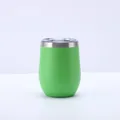 Detail view of a 12oz green stainless steel insulated eggshell tumbler with a clear lid - Green