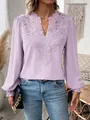 Detail of lavender long-sleeve top featuring intricate lace V-neck and dotted fabric texture - S / Tops / Light Purple