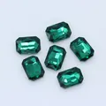 Group of six emerald green octagonal glass crystal rhinestones for DIY craft projects - Peacock Green