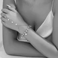 Elegant multi-layer pearl finger bracelet hand chain for women in silver finish - Multi-layer Artificial Pearl Fringe Linked Style / Silver