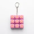 Porte-clés fidget mécanique 3x3 patte de chat rose pour soulager le stress au bureau - Patte de Chat Lumineuse à 9 Touches / Emballage en boîte / Rose