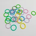 Primo piano dettagliato di vari anelli a O in silicone macaron colorati per mini keycaps. - Anello in silicone / Non luminoso / Multicolore