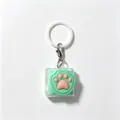 Porte-clés patte de chat en silicone vert menthe, jouet anti-stress et testeur de clavier - Anneau de suspension inclus / Léger / Vert