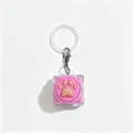 Porte-clés testeur de commutateur de clavier mécanique avec patte de chat rose en silicone - Anneau de suspension inclus / Léger / Rose